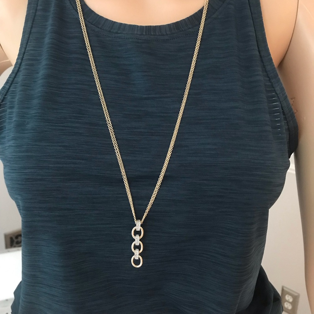 White House Black Market Long Adjustable Necklace. Gold colored. NWT.